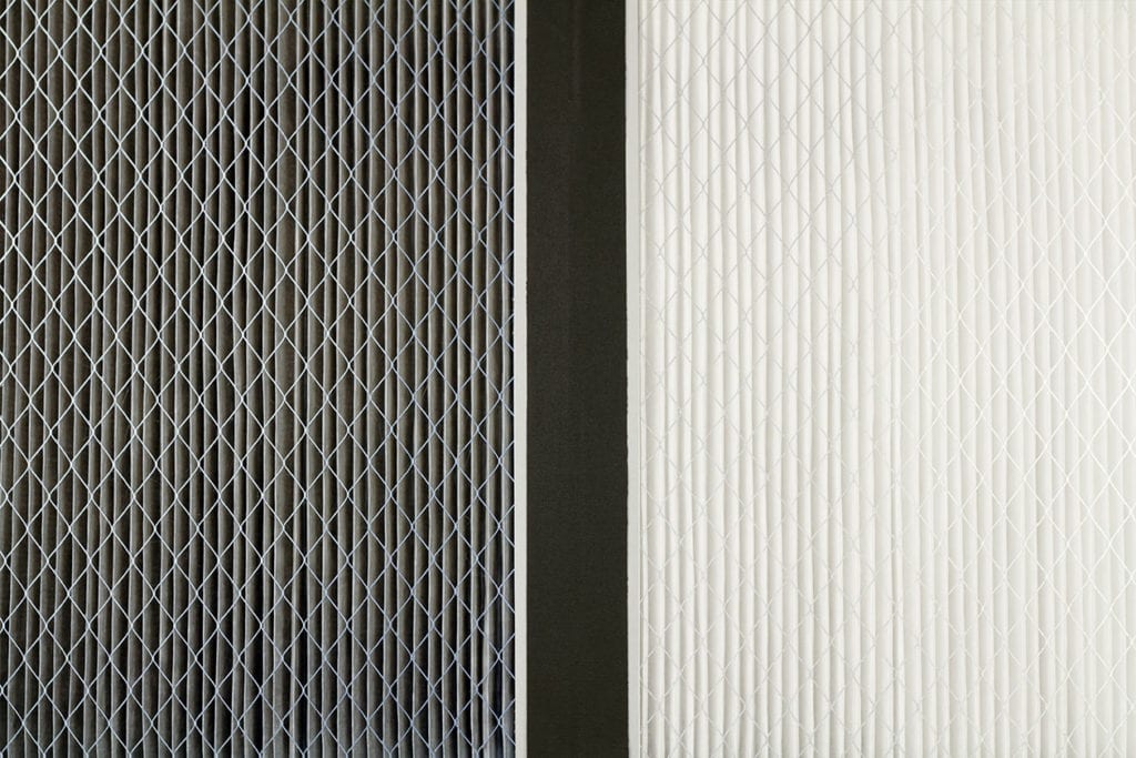 Air filters, dirty on left and clean on right.